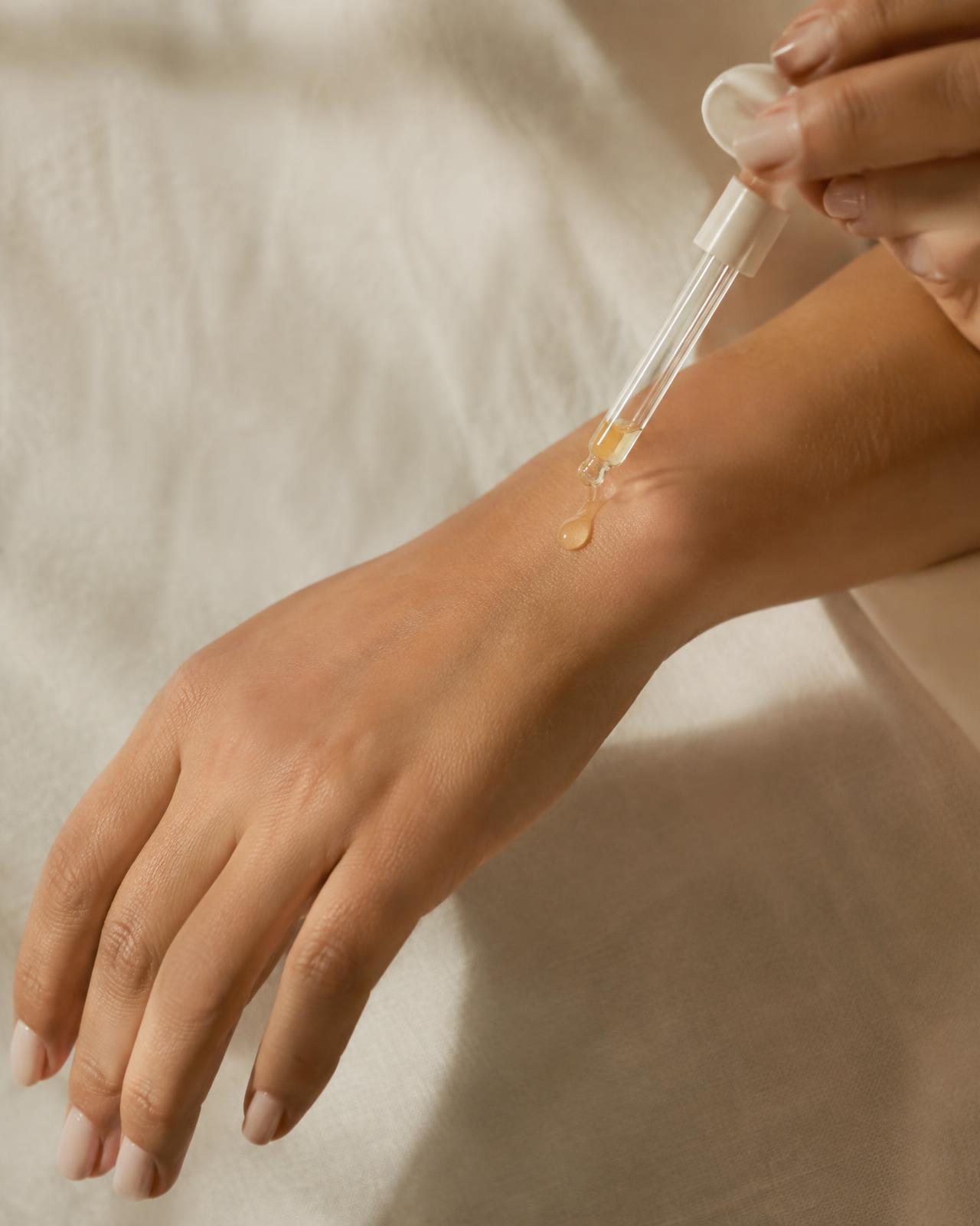 Applying a drop of serum